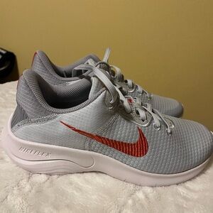 Nike flex Gray Athletic Sneakers with Red Swoosh